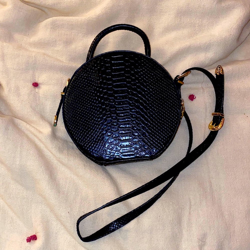 alice mccall round snakeskin bag